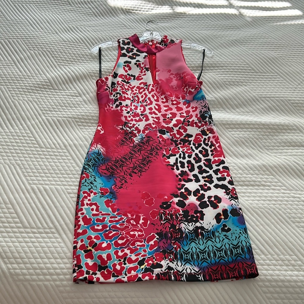 Bebe multi colored mini dress. Size medium.